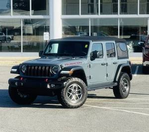 Jeep Wrangler Rubicon Gris Propre 2024 Gauche R18 4 Portes 4x4 d'Occasion Toit Ouvrant Démarrage à Distance Sièges en Cuir Pack Premium Boîte Automatique - Product Image 1