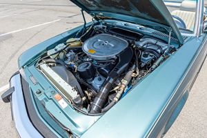Mercedes-Benz 560SL de 1988, poco uso, sin reserva, motor V8, color azul verdoso metalizado, techo rígido de fábrica incluido, sin modificar. - Product Image 6