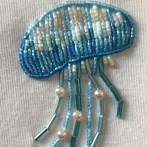 Llavero al por mayor de aleación con cuentas de piedras preciosas, dijes de estilo bohemio chapados en oro cristiano, impermeable y ecológico - Product Image 1