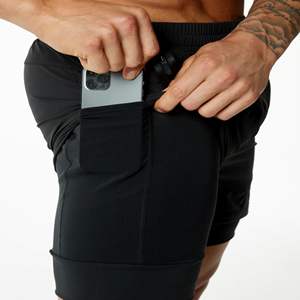 Plus lisse et plus doux 80% Nylon 20% élasthanne noir hommes Compression doublé tissé entraînement Short Baggy avec poches avant - Product Image 5