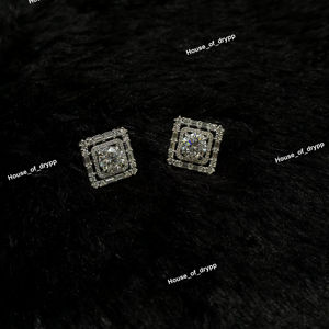 Boucles d'oreilles clous en moissanite taille ronde, argent 925, sertissage halo pavé baguette, bijoux de luxe hip-hop unisexe - Product Image 1