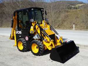 รถตักล้อยางขนาดเล็ก JCB 1CX ขับเคลื่อน 4 ล้อ พร้อมบุ้งกี๋ด้านหน้าและหัวขุดด้านหลัง สำหรับงานก่อสร้างและฟาร์ม - Product Image 6