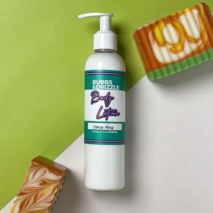 Lotion Corporelle Éclaircissante et Nourrissante au Beurre de Karité et Vitamine C Citrus Fling – Crème Corporelle Blanchissante 200ml et 500ml pour Soins de la Peau - Product Image 1