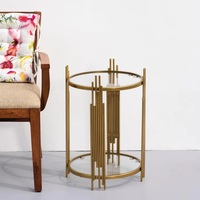 Mesa lateral de hierro con acabado dorado artesanal, mesa de diseño artístico con tapa de vidrio utilizado para comedor y sala de estar