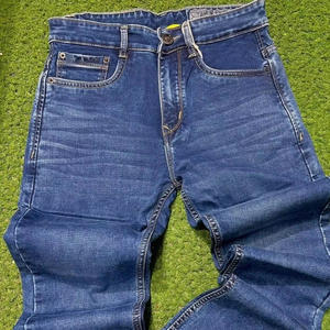 Jeans Casuales Personalizables, 100% Algodón, Oscuros, Desgastados, Transpirables, Impermeables, con Parches Personalizados en la Cintura, Tallas Grandes Disponibles - Product Image 1