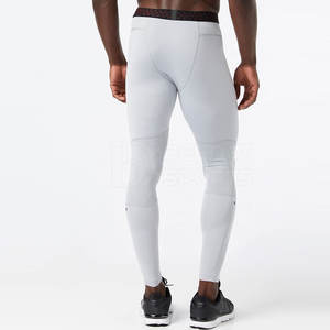 Collants de gymnastique de compression en coton sans couture pour hommes, leggings élastiques décontractés avec logo imprimé à la taille, pantalons de sport de fitness, vente en gros - Product Image 2