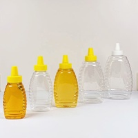 Bouteille en plastique PET transparente de 250g, 500g, 1000g pour miel, sauce, sirop, avec bouchon bec verseur