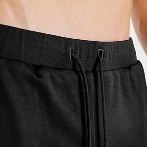 กางเกงขาสั้นสำหรับออกกำลังกายในฤดูร้อนของผู้ชายกางเกงขาสั้นผ้าฝ้ายสีดำเหลืองยืดได้มีลายสีพื้นมี6XL 2025สั่งผลิตได้ตามต้องการ - Product Image 5