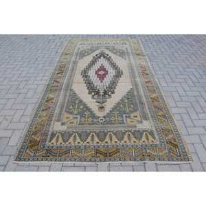 Tapis turc vintage de grande surface en laine à motif abstrait beige et bleu de 5.3x9.4 pieds avec support en latex pour chambre d'ado - Product Image 1