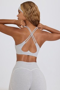 T-shirt de yoga personnalisé à ourlet en U pour femmes haut de fitness à épaules creuses léger respirant imperméable recyclable devant - Product Image 6