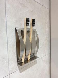 Soporte de cepillo de dientes de hierro con forma cilíndrica mínima diseñada para la organización y el estilo modernos del baño. - Product Image 2