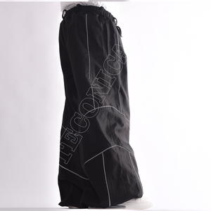 กางเกงหิมะสีดำคุณภาพสูงสำหรับฤดูหนาว พร้อมแถบสะท้อนแสง ทรงหลวมและปลายขาจั๊ม สำหรับกีฬากลางแจ้ง - Product Image 6