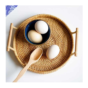 Venta al por mayor de bandejas de ratán de forma redonda con asa, cestas artesanales de almacenamiento para servir comida de restaurante del fabricante de Vietnam - Product Image 4