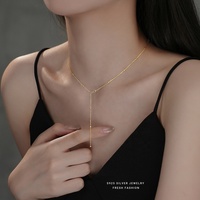 Collier unisexe élégant tendance en argent sterling 925 plaqué or 18 carats avec pendentif en forme de Y et pompon