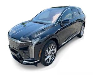 ENVÍO RÁPIDO CERTIFICADO PARA CADIILLAC OP-TIQ Sport 1 AWD USADO 2025 (RHD-LDH) con Cámara Trasera y Asientos de Cuero - Product Image 1