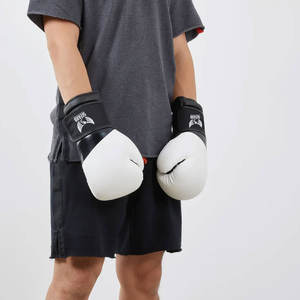 Gants de boxe d'entraînement de combat confortables Gants de boxe de couleur unie Gants de boxe avec logo personnalisé - Product Image 4
