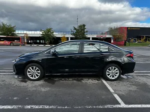 2023 C0R0-LLA XII (E210) Low Mileage Sound Engine AUTOMATIC Transmission <b>Panoramic</b> roof lights Ready to Ship - Product Image 4