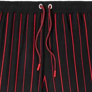 Bañador versátil para hombre con cómodos bolsillos laterales en la cintura y características de secado rápido para relajarse junto al agua - Product Image 3