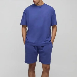 Conjunto Deportivo de Verano para Hombre, Color Sólido, Venta Caliente, Camiseta de Manga Corta Holgada y Pantalones Cortos Cómodos, Dos Piezas, Estilo Casual - Product Image 1