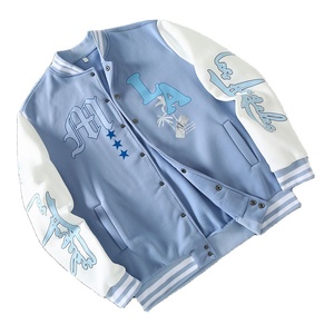 Chaqueta universitaria azul cielo con mangas de piel sintética blanca, diseño de ropa de calle bordada y puños acanalados a rayas - Product Image 1