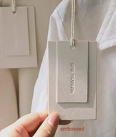Étiquette de vêtements personnalisée protection de l'environnement impression d'écran carton épais papier oscillant Étiquette de