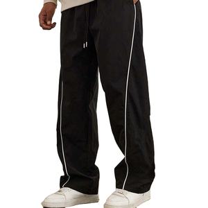 Ventes en gros de coupe-vent personnalisés avec impression d'écriture, streetwear, coupe-vent en nylon évasé, pantalon de survêtement ample pour hommes 2026 - Product Image 2