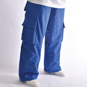 Pantalones de esquí de nieve de carga impermeables y a prueba de viento azul real unisex con múltiples bolsillos cintura ajustable y ajuste relajado - Product Image 3