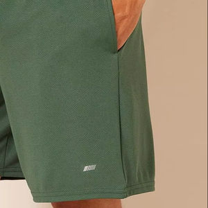 Pantalones cortos holgados Performance Tech para hombre (disponibles en grandes y altos), - Product Image 1