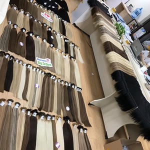 Paquetes de cabello vietnamita crudo de alta calidad al por mayor inclino extensiones de cabello cuerpo de agua ondulado color negro - Product Image 3