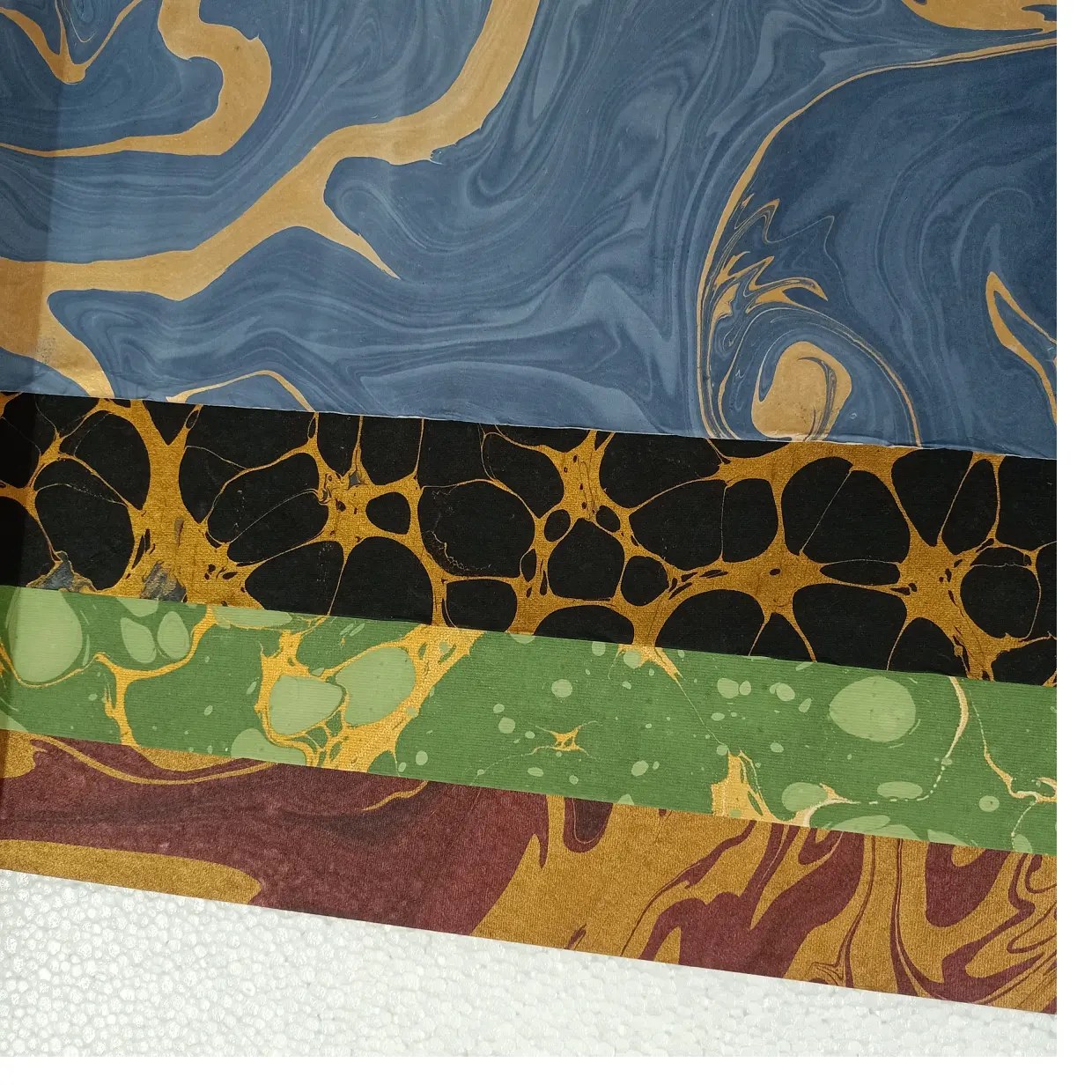 custom made marble printed papers in assorted patterns and colorways ideal for gift wrapping and suitable for resale