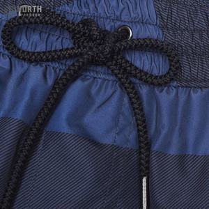 Shorts de sport décontractés pour hommes, vêtements de sport d'été, séchage rapide, coton, maille, couleur unie, taille élastique, shorts de sport coupe-vent, imperméables - Product Image 5