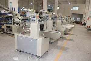 Máquina de embalaje de cajas de plástico inteligente automática eléctrica serie hecha en Vietnam para envolver alimentos Motor de llenado y encolado - Product Image 4