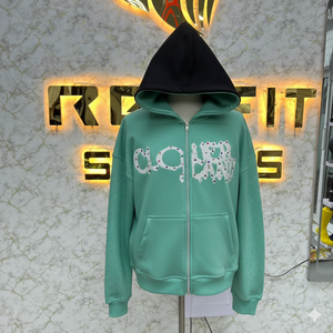 เสื้อฮู้ดซิปสีส้มโคลเวอร์ ยูนิเซ็กส์ สตรีทแวร์ ผ้าฟลีซ โอเวอร์ไซส์ พิมพ์ลายโลโก้ด้านหน้าประดับคริสตัล แขนเสื้อปกติ สำหรับฤดูใบไม้ร่วง - Product Image 2