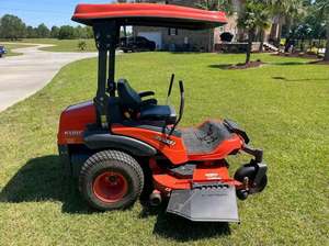 รถตัดหญ้าแบบ Zero Turn Wheel Tractor ขนาด 21 แรงม้า เครื่องยนต์เบนซิน ใบมีดตัดหญ้ากว้าง พร้อมถังเก็บหญ้าด้านหลัง สำหรับพื้นที่เพาะปลูกและสวนผลไม้ - Product Image 3