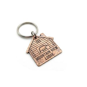 Porte-clés d'hôtel personnalisé en zinc plaqué or avec logo imprimé UV et émail souple - Product Image 6