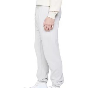 Vente en gros de pantalons de sport unisexe avec fermeture éclair et poches latérales pantalons de survêtement de gymnastique personnalisés pour entraînement décontracté pantalons de jogging pour hommes - Product Image 4