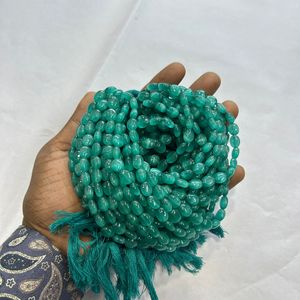 Monalisa ลูกปัดแก้วทรงวงรีสีฟ้าธรรมชาติขนาด7/9มม. พลอยสีเขียวหนึ่งเส้น12นิ้ว - Product Image 2