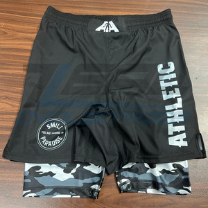 Pantalones cortos de doble capa 2 en 1 pantalones cortos de lucha mma logotipos personalizados microstretch tela sublimación pantalones cortos dobles hechos en Pakistán - Product Image 1