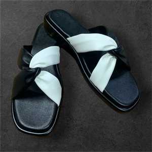 Black & White Knot Flat Sandals with Comfortable Cushioning - Product Image 1
