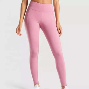 Fabricante de ropa activa profesional Venta caliente Fitness Cintura alta Ropa de mujer Leggings de yoga 100% Algodón con bolsillo lateral - Product Image 1