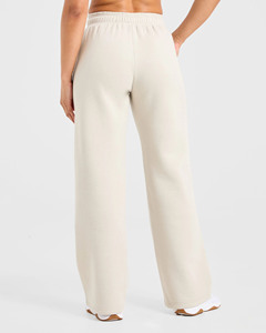 Sudaderas con capucha de invierno de alta calidad Joggers Pantalones y pantalones de mujer Impresión de logotipo personalizado con bolsillos Pantalones de chándal de entrenamiento físico suave - Product Image 2