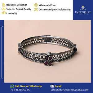 Proveedor de origen indio de brazaletes con tachuelas de piedra de rubí de plata oxidada con motivos florales para uso de regalos de bodas y fiestas - Product Image 2