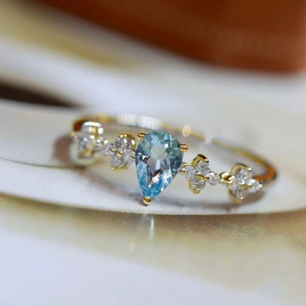 แหวนใส่นิ้วประดับเพชรเพทายสีน้ำเงินปรับได้แหวนเงินสเตอร์ลิง S925ทองหรูหราแหวนหมั้นของผู้หญิงจากกวงดองทันสมัย
