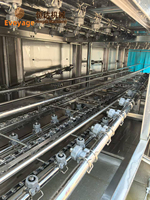 Machine de lavage industrielle continue de type tunnel pour paniers, boîtes, palettes, plateaux et caisses en plastique, utilisable par une seule personne