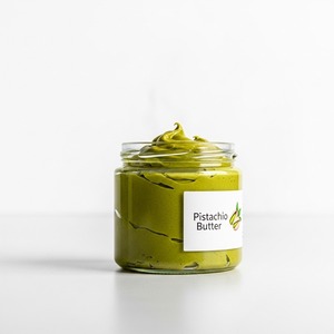 Mantequilla de pistacho fresca orgánica totalmente natural rica en fibra y proteínas vegetales para la preparación de comidas después del entrenamiento o aperitivos rápidos - Product Image 1