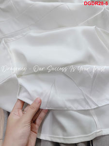 Jupe légère en forme de A avec doublure anti-révélation à l'intérieur créant un accent de nœud au col il y a 2 poches en dessous de 2024 bureau - Product Image 5