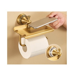 Porte-serviettes antique en laiton doré avec un design artistique ajouré, parfait pour les dîners formels et les idées de décoration de table à la maison - Product Image 1