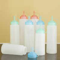 Bouteilles de sauce en plastique de 33oz avec buse à jet de ketchup vides condiments au miel vinaigrette pour huiles rechargeables de fête