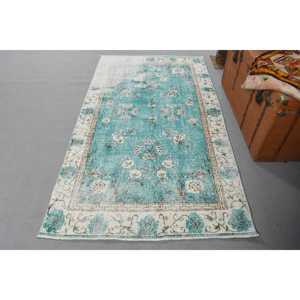 Alfombra vintage de 3.7x6.6 pies (114x202 cm), alfombra de lana turca azul con motivos de plantas y árboles - Product Image 1