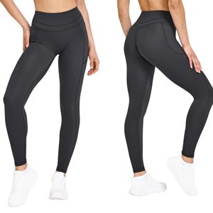 Leggings de yoga taille haute unis pour femme avec poches latérales, effet ventre plat et rehaussement des fesses, extensibles dans quatre directions, pour la gym - Product Image 1